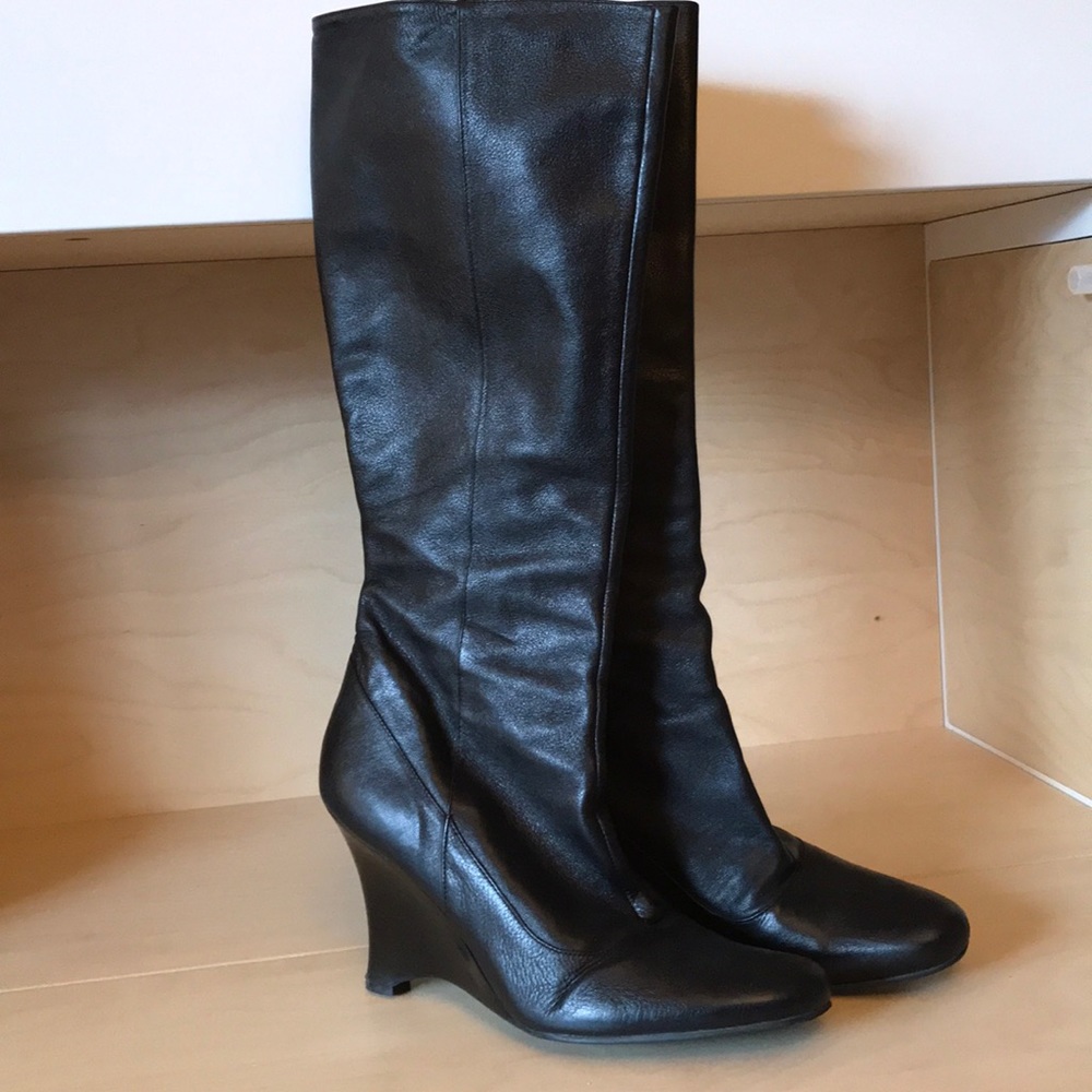 Tall black leather boots with wedge heel. Size 10